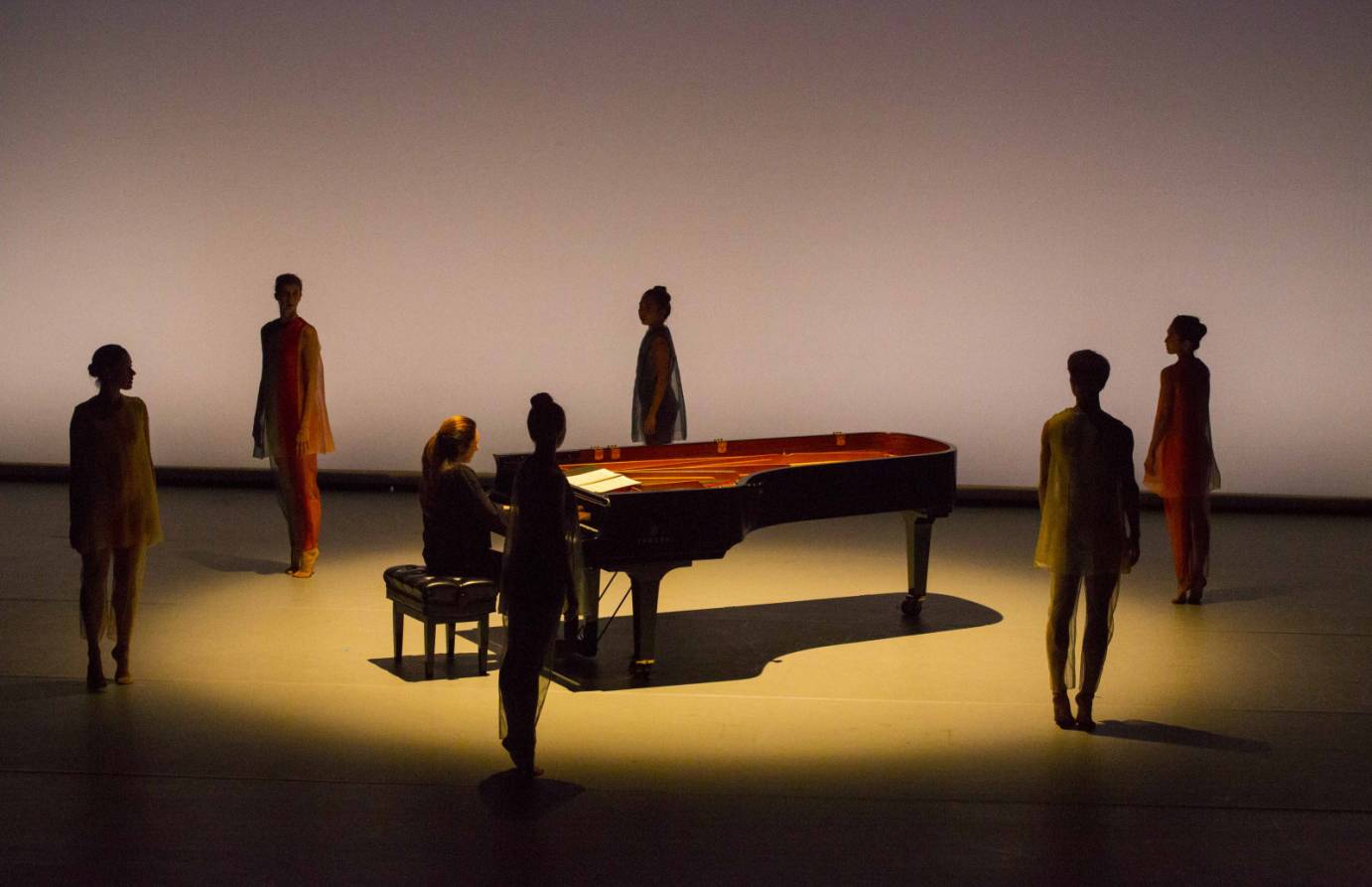 Dancers in shadow ring pianist Simone Dinnerstein